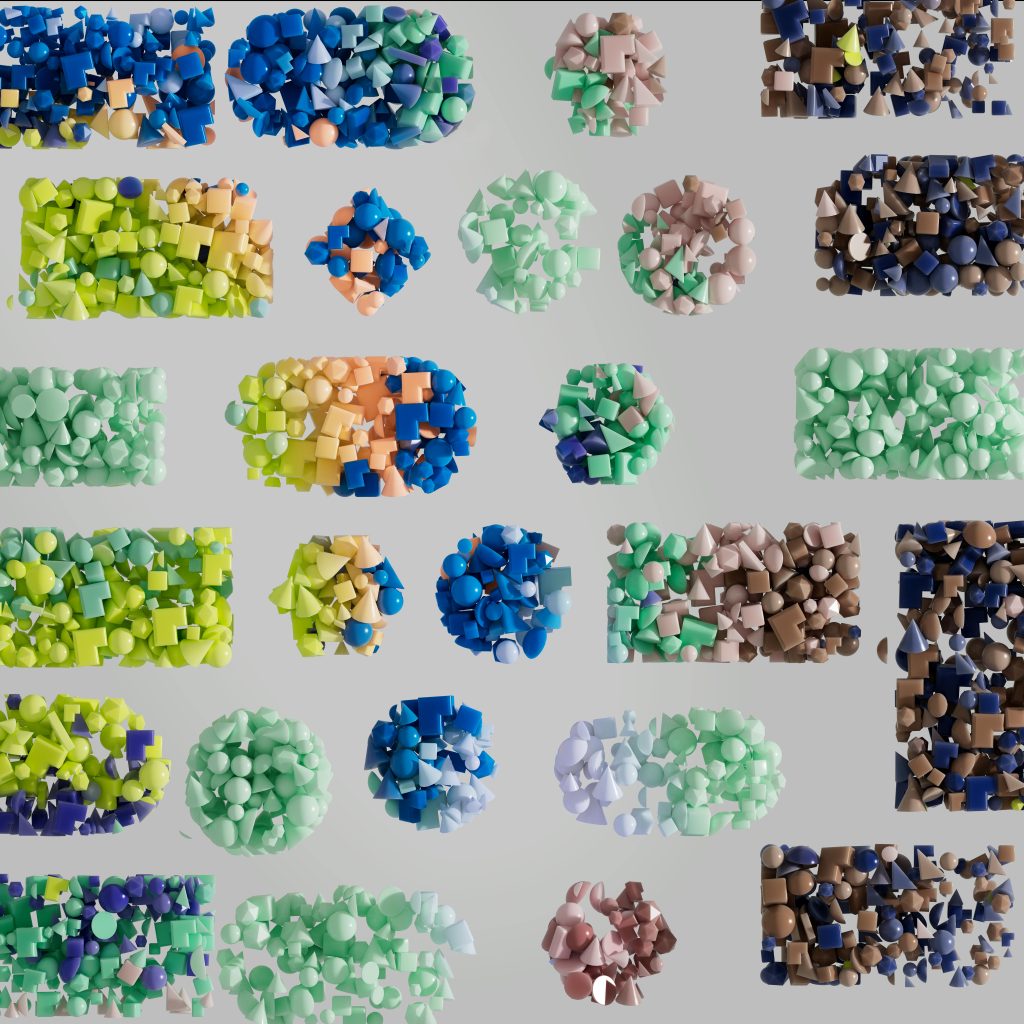 Vividly colored 3D geometric shapes arranged randomly against a gray backdrop, showcasing modern art.